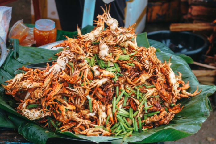 Crunchy deep-fried mini crabs at a local street market