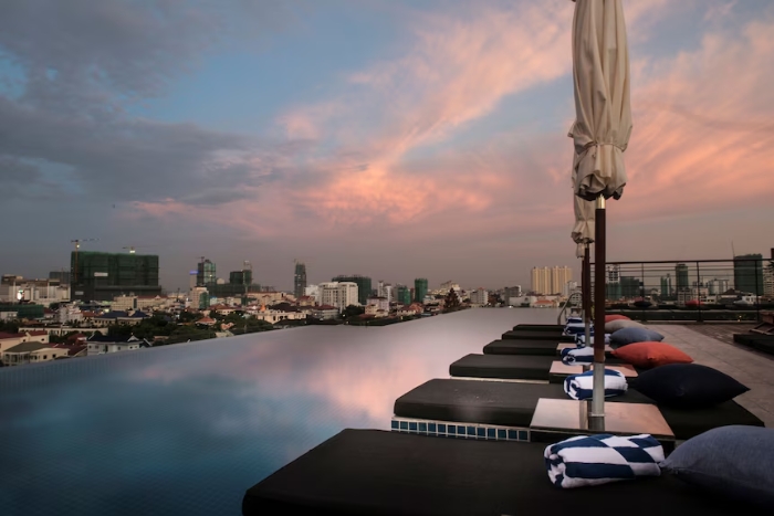 Enjoy a fantastic experience admiring the sunset from the outdoor saltwater infinity pool