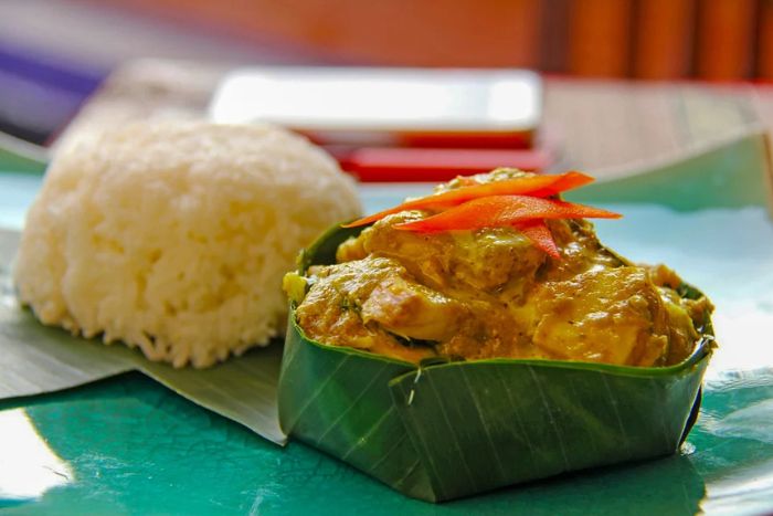 Taste amok, a fish steamed in a banana leaf with a coconut milk and spice sauce