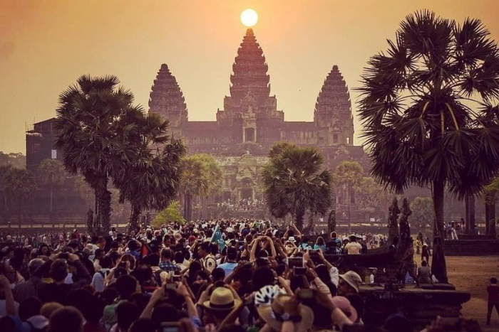 Watching the sunrise at Angkor Wat - one of the things to do in Siem Reap Cambodia