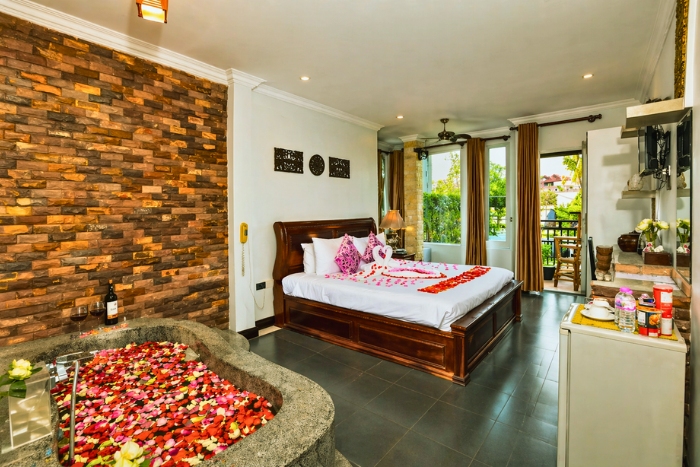 Experience the comfort of a well-appointed room at Five Senses Boutique Hotel