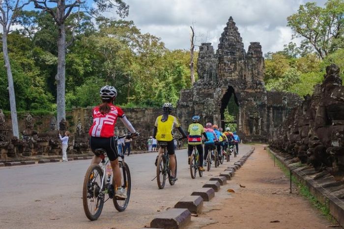 Exploring Angkor by bike offers calm, freedom, and shaded routes