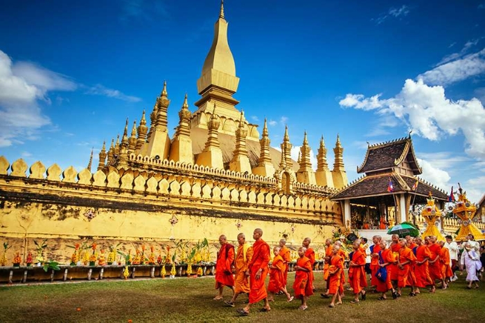 Admire the majestic That Luang on your 30-day Indochina tour