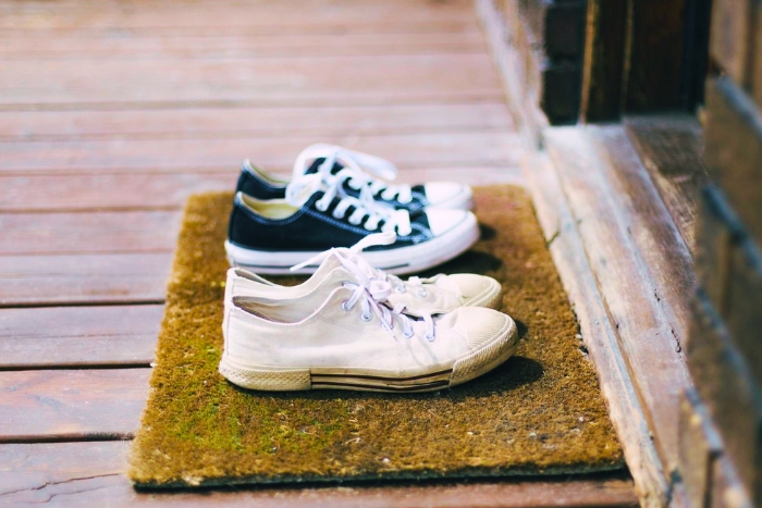 Leave footwear outside to show respect