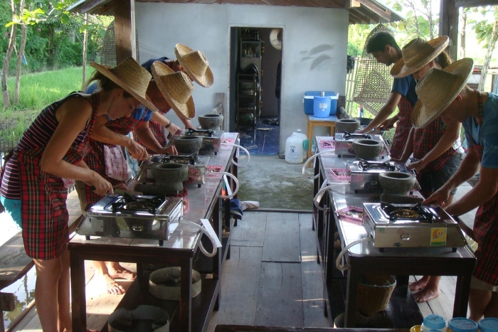 Learning to cook vegetarian Thai dishes with fresh garden ingredients