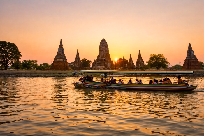 Spiritual immersion at Wat Chaiwatthanaram at sunset