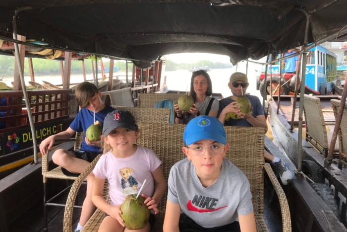 Sampan cruise in Mekong Delta with family in Vietnam summer vacation