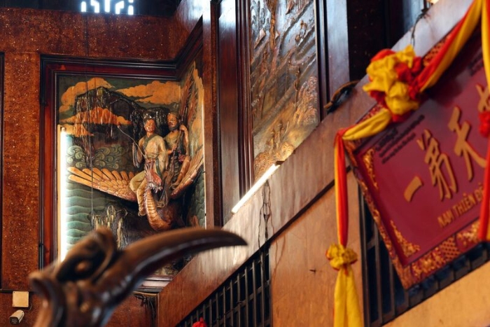The frames and doors are finely carved and pierced, with remarkable artistic refinement