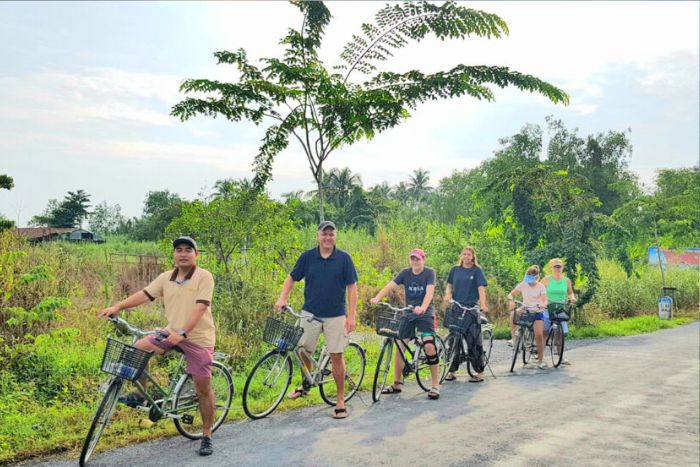 Cycling through fragrant orchards in the Mekong Delta