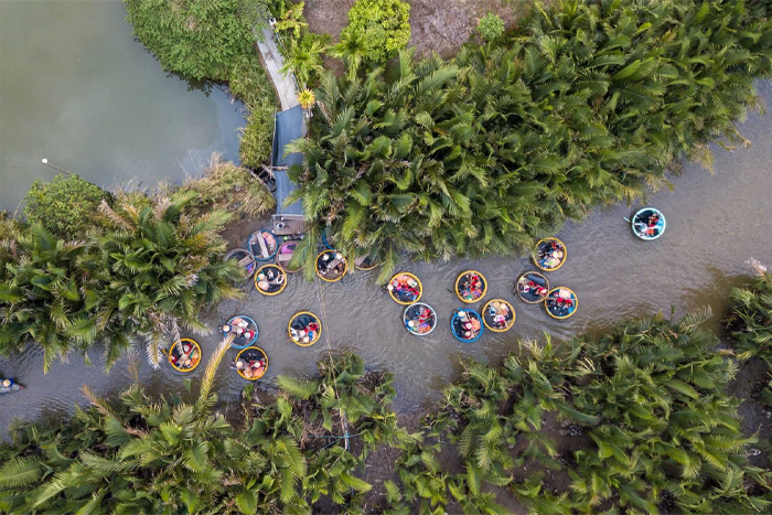 Sampan ride under the coconut trees in Ben Tre