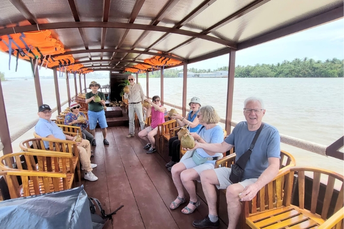 Exploring the Mekong delta by sampan