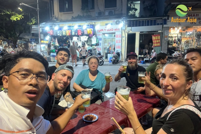 Explore street food in Hanoi on the first day of the 3-week Vietnam tour