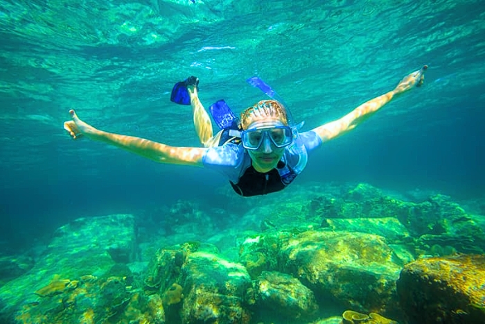 Snorkeling in the clear waters of H&ograve;n Mun, Nha Trang