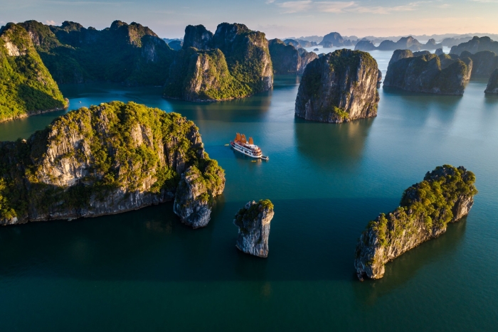 Arrive at Ha Long Bay, a UNESCO World Heritage Site, on a 2-week Vietnam Laos luxury tour