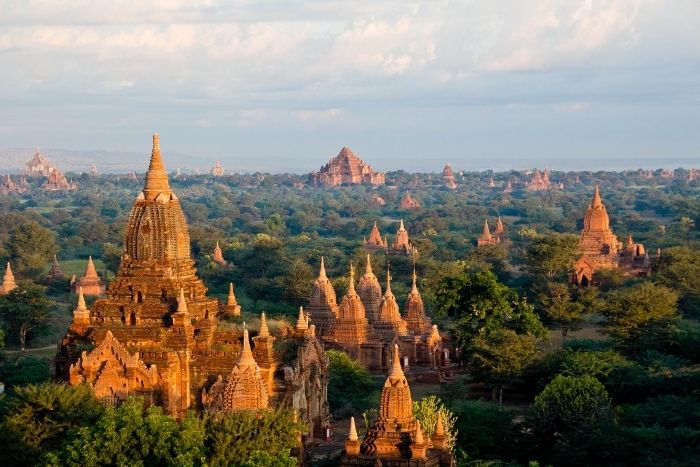 The temples of Bagan in June are surrounded by lush green landscapes