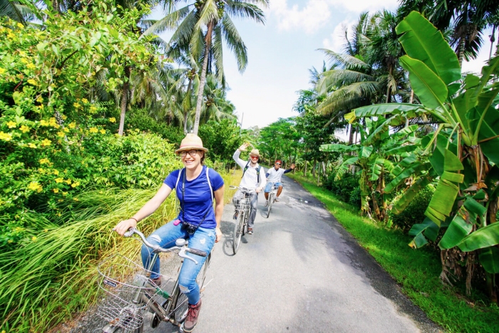 Cycling through peaceful villages and lush green orchards