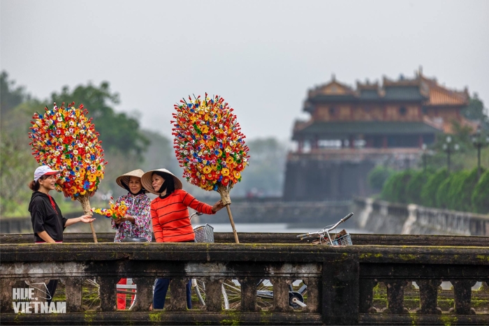 Paper flowers appear everywhere in Hue before Tet festival in Vietnam