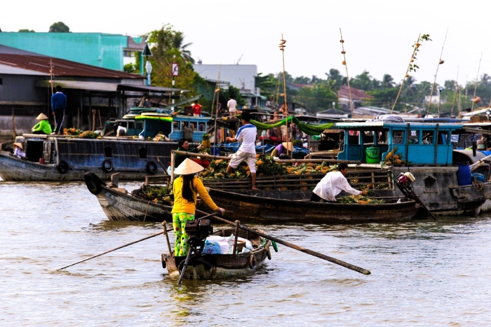 Sampan cruise along the river channels in Ben Tre during your itinerary Vietnam Phu Quoc